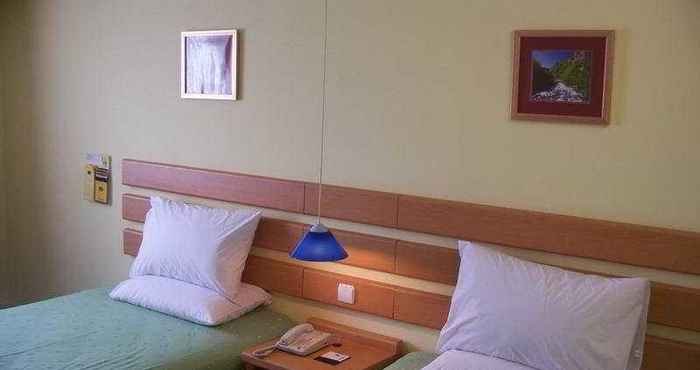 Kamar Tidur Home Inn Zhongshan Road