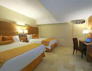 Phòng ngủ 2 Hotel Suites Ambassador