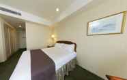 Bedroom 7 International Resort Hotel Yurakujo