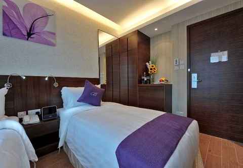 Kamar Tidur The Bauhinia Hotel-TST