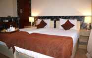 Kamar Tidur 4 Eaton Square Hotel