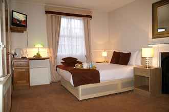 Kamar Tidur 4 Eaton Square Hotel