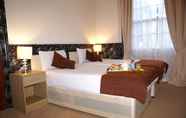 Kamar Tidur 7 Eaton Square Hotel