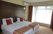 Kamar Tidur 7 The Bridge House Hotel