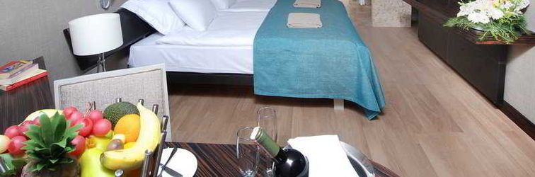 卧室 Commodore Elite Suites & Spa Hotel