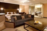 Kamar Tidur Justwin Grand Hotel