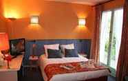 Bedroom 5 Brit Hotel Florimo