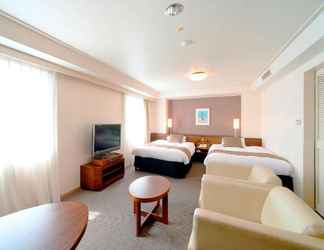 Bedroom 2 Alpico Plaza Hotel