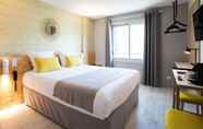 Kamar Tidur 5 T Boutique Hotel