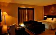 Kamar Tidur 4 Tat Place Hotel