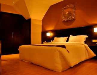 Kamar Tidur 2 Tat Place Hotel