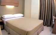 Kamar Tidur 4 The Center Suites