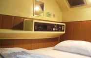 Phòng ngủ 4 Capsule Kinuya Hotel Ikebukuro - Men Only