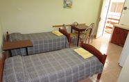 Kamar Tidur 6 Bosetti Apart Hotel