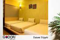 Kamar Tidur Eight Days Boutique Hotel Permas Jaya