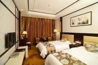ห้องนอน Xingui Hotel