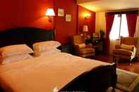 Kamar Tidur The Smokehouse Hotel