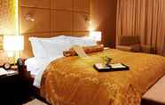 Kamar Tidur 5 Zibo Blue Horizon International Hotel