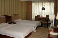 Kamar Tidur Jiahe Business Hotel