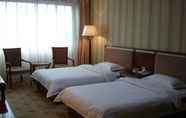 Kamar Tidur 6 Jiahe Business Hotel