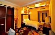 Kamar Tidur 4 Youjia Hotel and Apartment Guangzhou Huadu