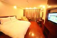 ห้องนอน GreenTree Inn Jiujiang Shili Road Business Hotel