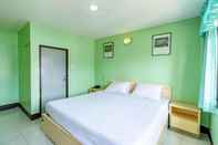 Kamar Tidur Woodlands Inn