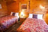 Bilik Tidur Harold's Place Cabins & Inn