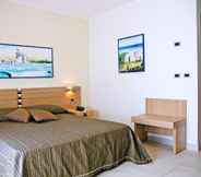 Phòng ngủ 7 Costa del Salento Village