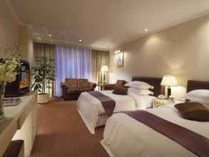 Kamar Tidur 4 Long Quan Hotel