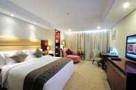 Bedroom Howard Johnson by  Business Club Hotel Shaoxing