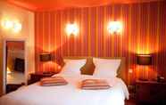 Bedroom 2 Logis Hotel le Faisan Dore