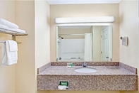 In-room Bathroom Super 8 by Wyndham Forrest City AR