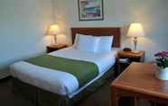 Bedroom 4 Americas Best Inns & Suites-Lincoln City