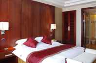 Bedroom Harbour Oriental Hotel