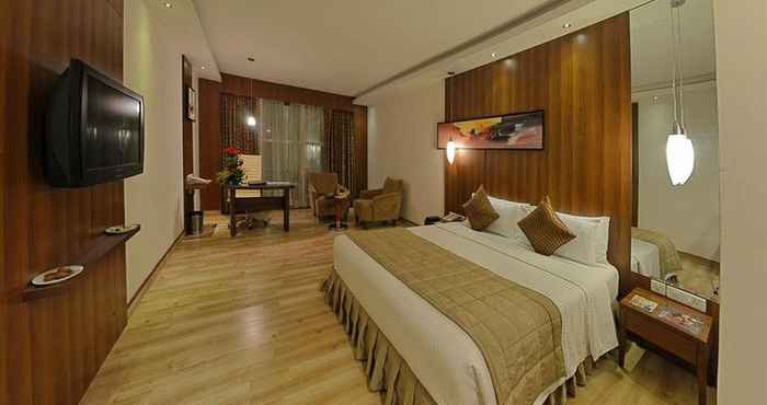 Bilik Tidur Clarion Hotel Tirupur