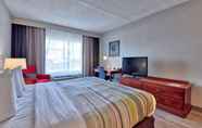 Bedroom 2 Country Inn & Suites by Radisson, Ocala FL