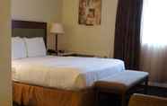 Bedroom 4 Lexington Inn & Suites - N.W. Chicago West/Elgin