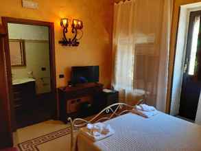 Bilik Tidur 4 Residenza L'Antico Borgo Hotel