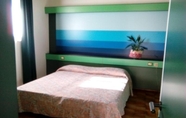 Kamar Tidur 5 Hotel Club Baia Delle Ginestre