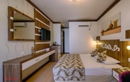 ห้องนอน 7 Risus Hotel Side