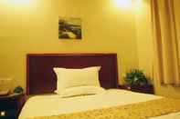 ห้องนอน GreenTree Inn Taizhou North Qingnian Road Hotel