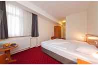 Bedroom Novum Business Hotel Belmondo Hamburg Hauptbahnhof