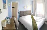 Bedroom 7 Hotel Le Bretagne