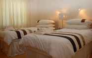 Kamar Tidur 6 The INN Guest House