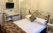 Kamar Tidur 5 Diamonds Inn