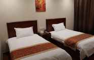 Kamar Tidur 2 GreenTree Inn Shanghai Dabaishu Business Hotel