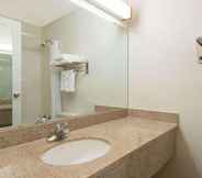 In-room Bathroom 6 Ramada by Wyndham Laramie