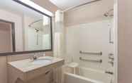 In-room Bathroom 7 Super 8 by Wyndham Carrollton