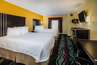 Bedroom 4 Days Inn & Suites Wyndham Augusta Near Fort Gordon